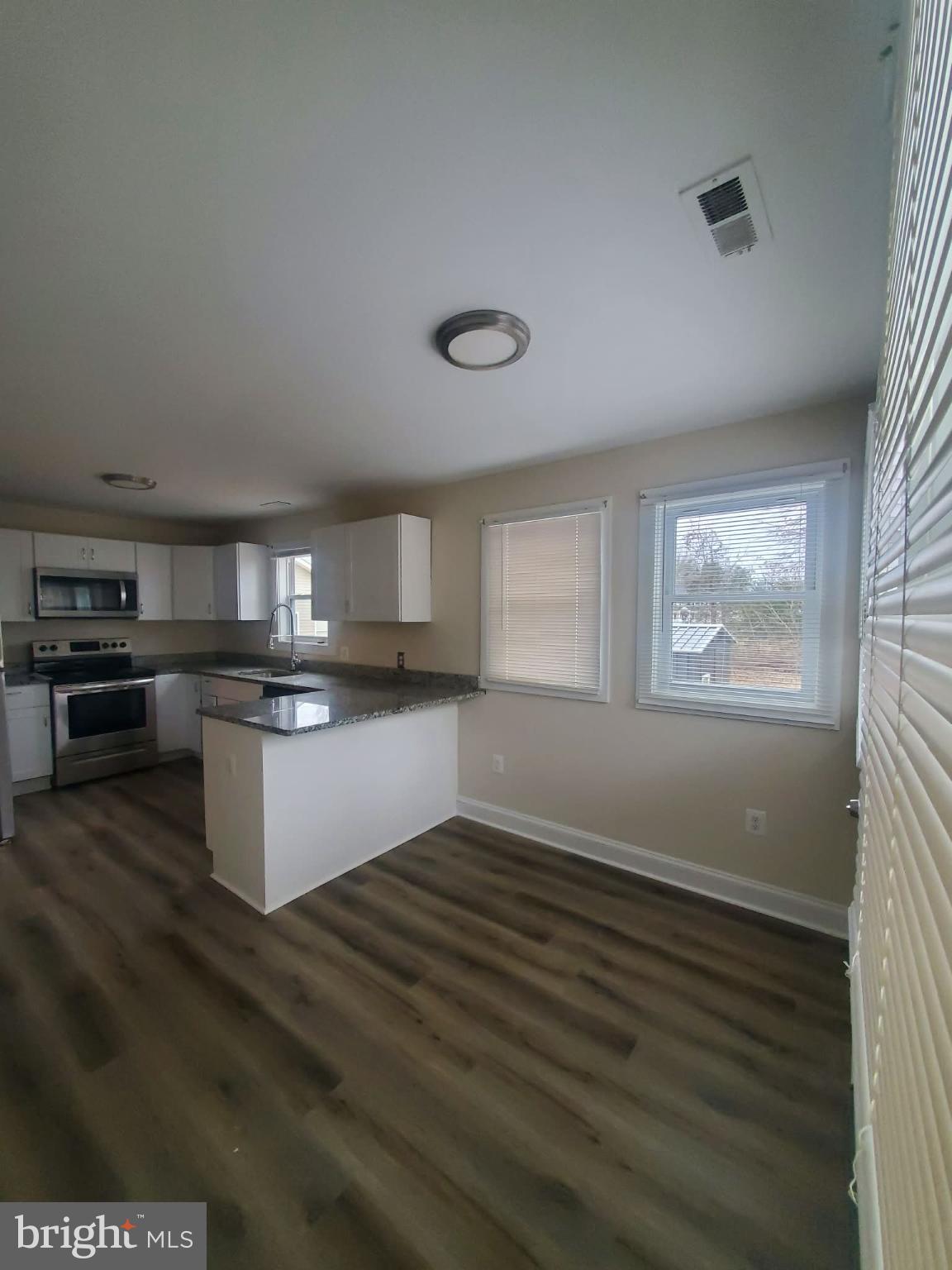 17 Robin Road Stafford, VA 22554 - Photo 10 of 17 Bright and airy kitchen with modern finishes.