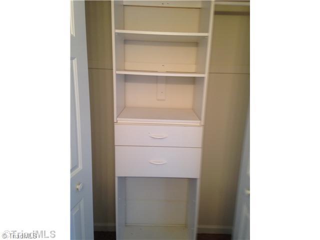 7107 North River Road Oak Ridge, NC 27310 - Photo 11 of 16 Storage. All bedroom closets have built-ins