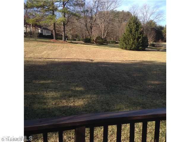 7107 North River Road Oak Ridge, NC 27310 - Photo 13 of 16 View. View of Back Yard from Deck