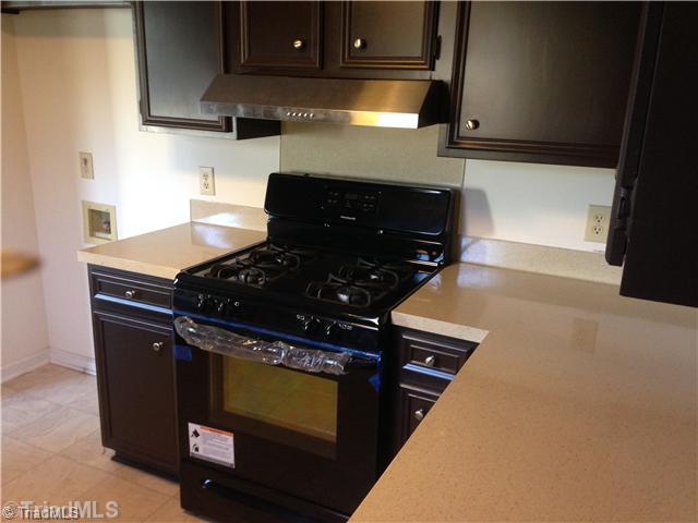 7107 North River Road Oak Ridge, NC 27310 - Photo 5 of 16 Kitchen. New Range/Oven