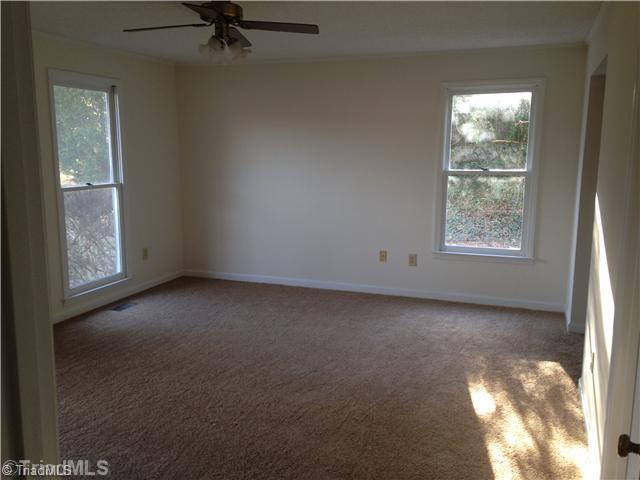 7107 North River Road Oak Ridge, NC 27310 - Photo 6 of 16 Master Bedroom.