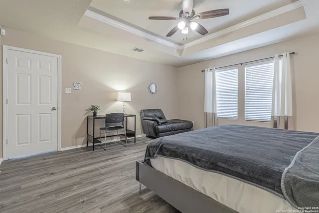 a white bath tub sitting next to a window