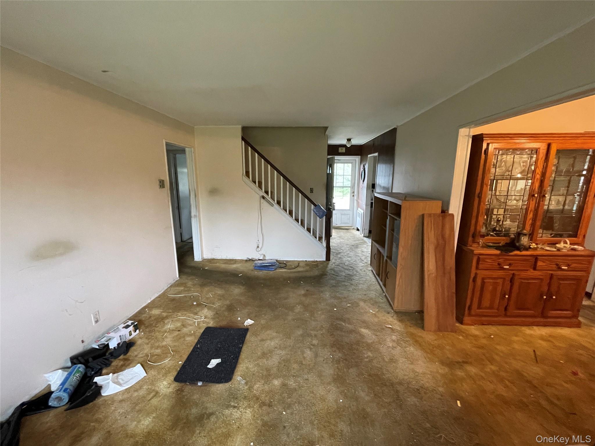 2043 Paddock Road Seaford, NY 11783 - Photo 10 of 25 a view of a livingroom with furniture and a window