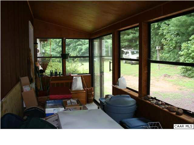 2235 Poor House Road Syria, VA 22743 - Photo 11 of 24 a living room with furniture and large windows