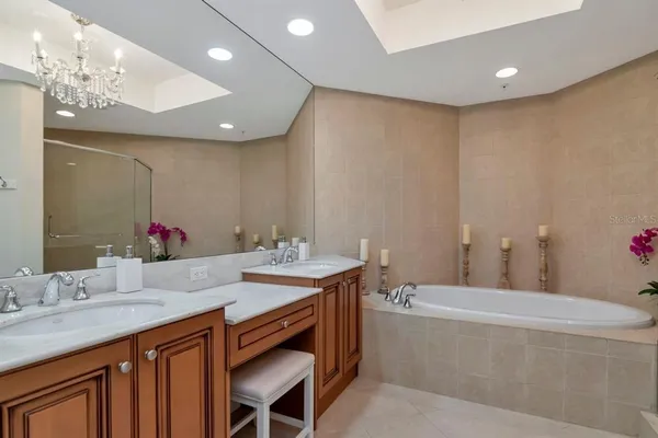 a view of a balcony with a potted plant and outside view