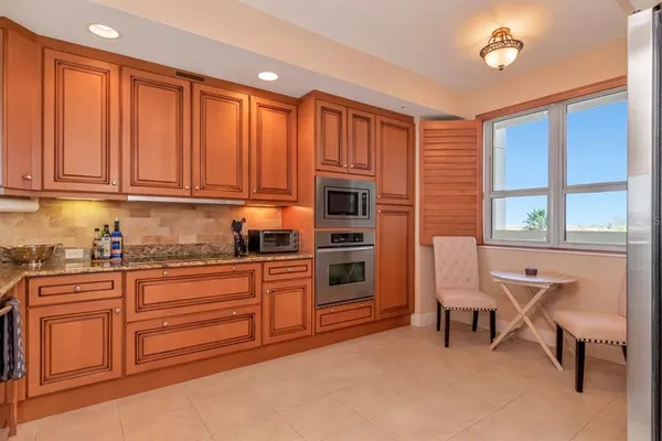 a view of a livingroom with furniture and a fireplace