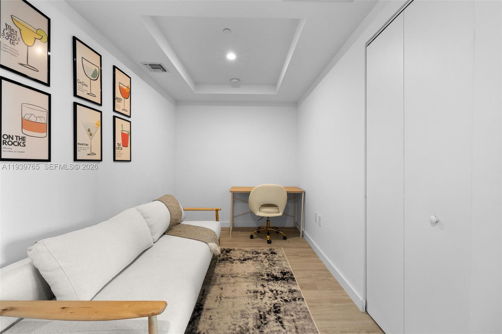 45 Southwest 9th Street, Unit 3802 Miami, FL 33130 - Photo 12 of 49 a living room with furniture and a rug