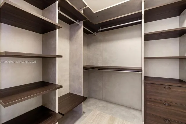 a view of an empty walk in closet