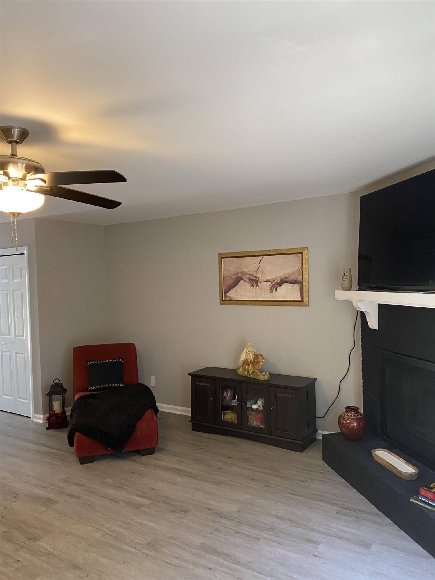 643 Springview Trail Garner, NC 27529 - Photo 13 of 34 a living room with furniture and a flat screen tv