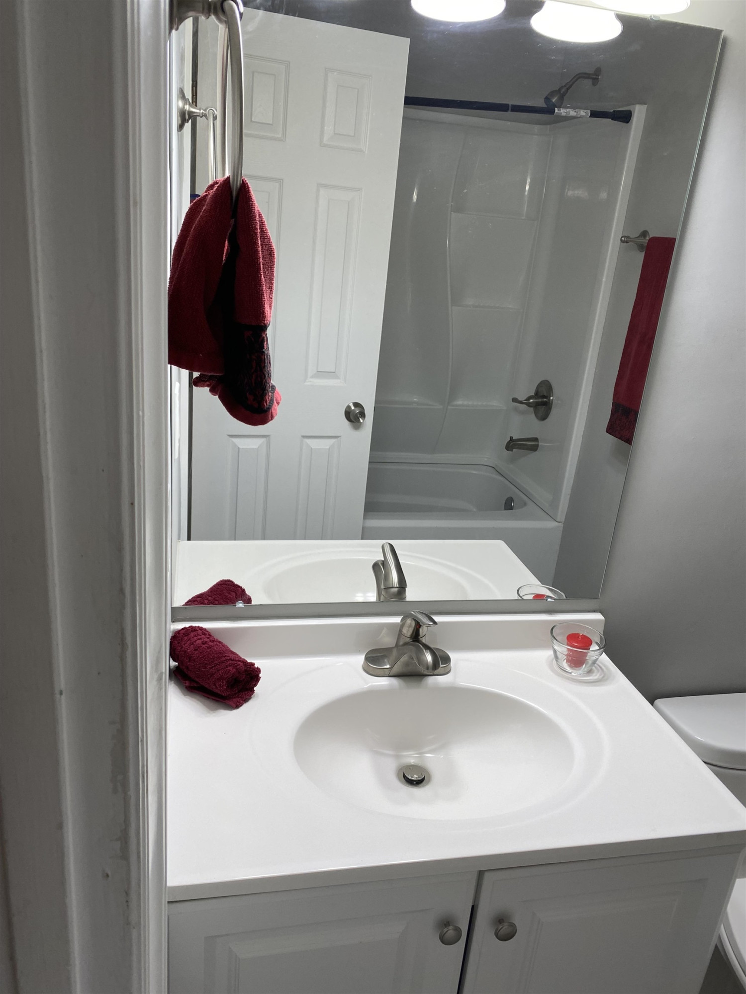643 Springview Trail Garner, NC 27529 - Photo 28 of 34 a bathroom with a sink and a mirror