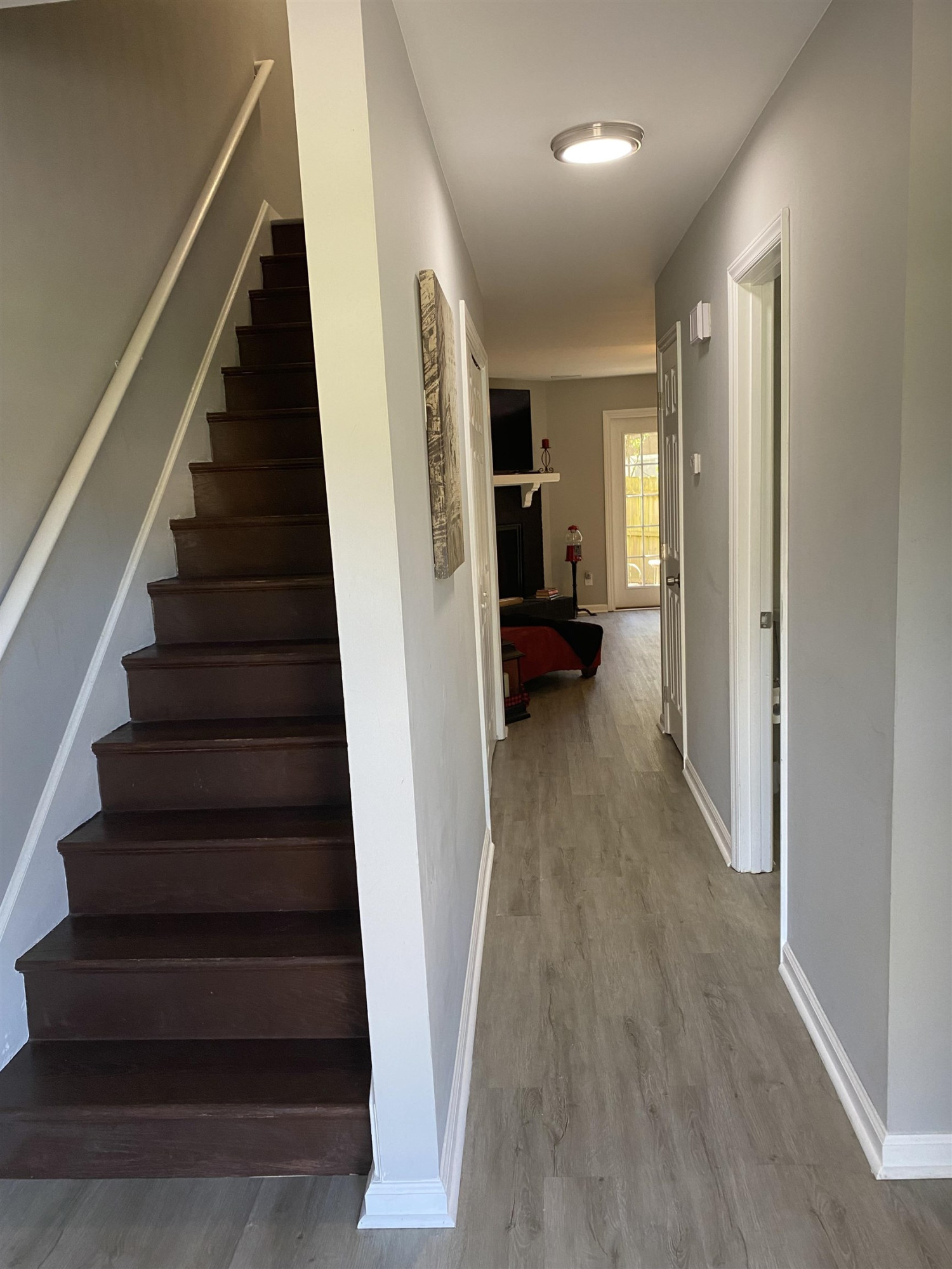 643 Springview Trail Garner, NC 27529 - Photo 5 of 34 a view of entryway and hall with wooden floor