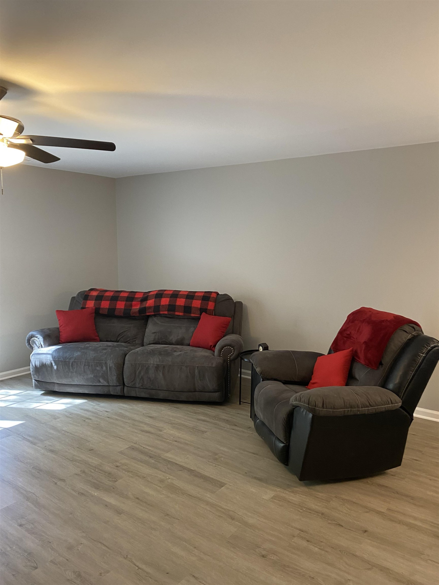 643 Springview Trail Garner, NC 27529 - Photo 8 of 34 a living room with furniture and a wooden floor
