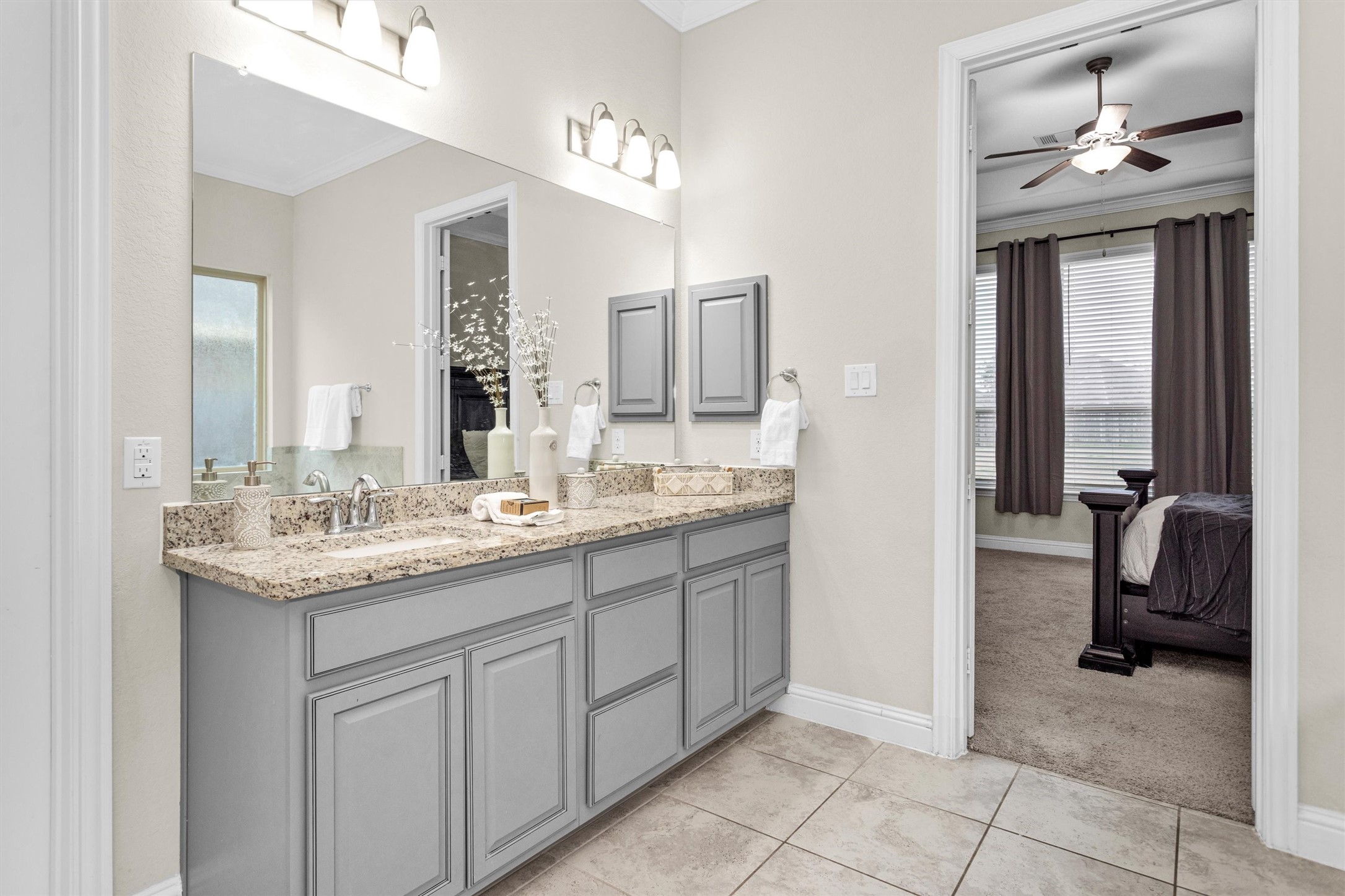 3622 Lister Drive Rosharon, TX 77583 - Photo 22 of 44 a bathroom with a granite countertop sink and a mirror