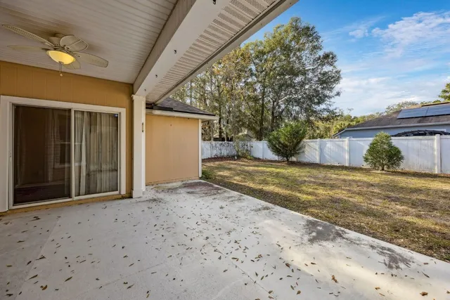 a view of backyard of a house