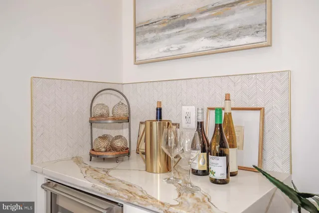 a kitchen with a stove a sink and a refrigerator