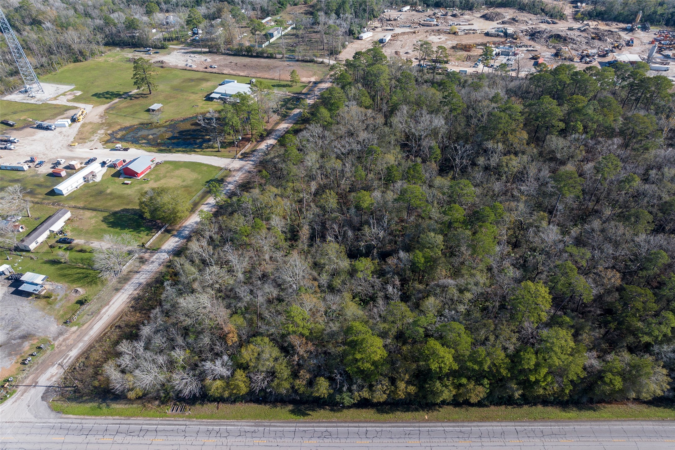 0 Fm 1485 Road New Caney, TX 77357 - Photo 10 of 13 a view of a lake with large trees