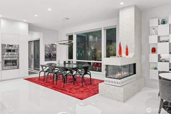 a living room with fireplace furniture and a flat screen tv