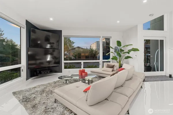 a bedroom with a bed and a couch