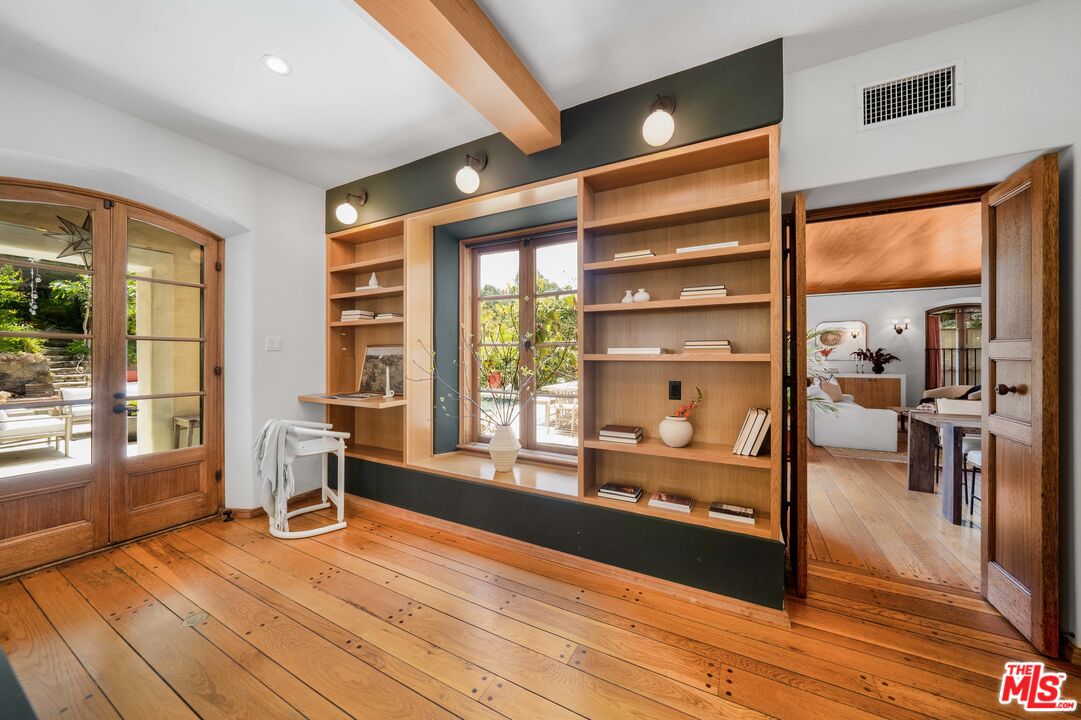 4124 Dundee Drive Los Angeles, CA 90027 - Photo 15 of 54 a living room with wooden floor and large windows