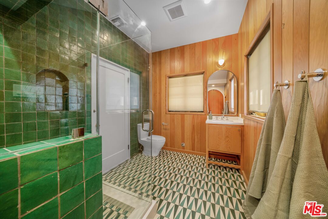 4124 Dundee Drive Los Angeles, CA 90027 - Photo 21 of 54 a bathroom with a bathtub and a shower