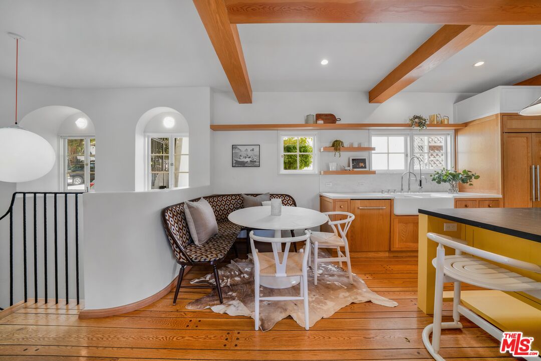 4124 Dundee Drive Los Angeles, CA 90027 - Photo 46 of 54 a view of a dining room with furniture and wooden floor