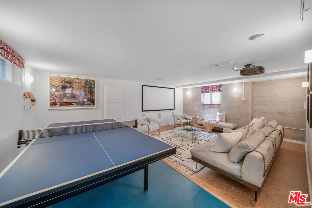 4124 Dundee Drive Los Angeles, CA 90027 - Photo 49 of 54 a living room with furniture and a flat screen tv