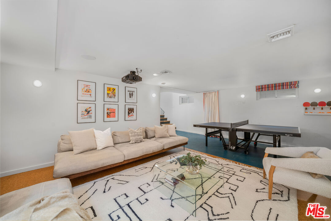 4124 Dundee Drive Los Angeles, CA 90027 - Photo 50 of 54 a living room with furniture and wooden floor