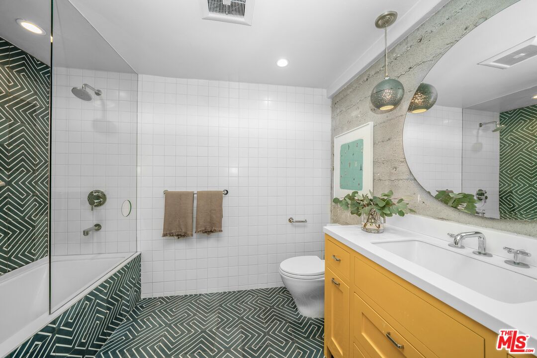 4124 Dundee Drive Los Angeles, CA 90027 - Photo 51 of 54 a bathroom with a sink a toilet and shower