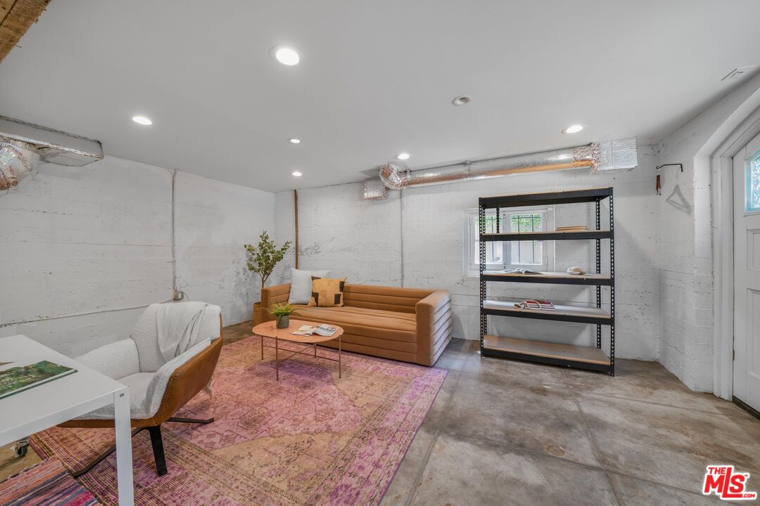 4124 Dundee Drive Los Angeles, CA 90027 - Photo 52 of 54 a living room with furniture and a window