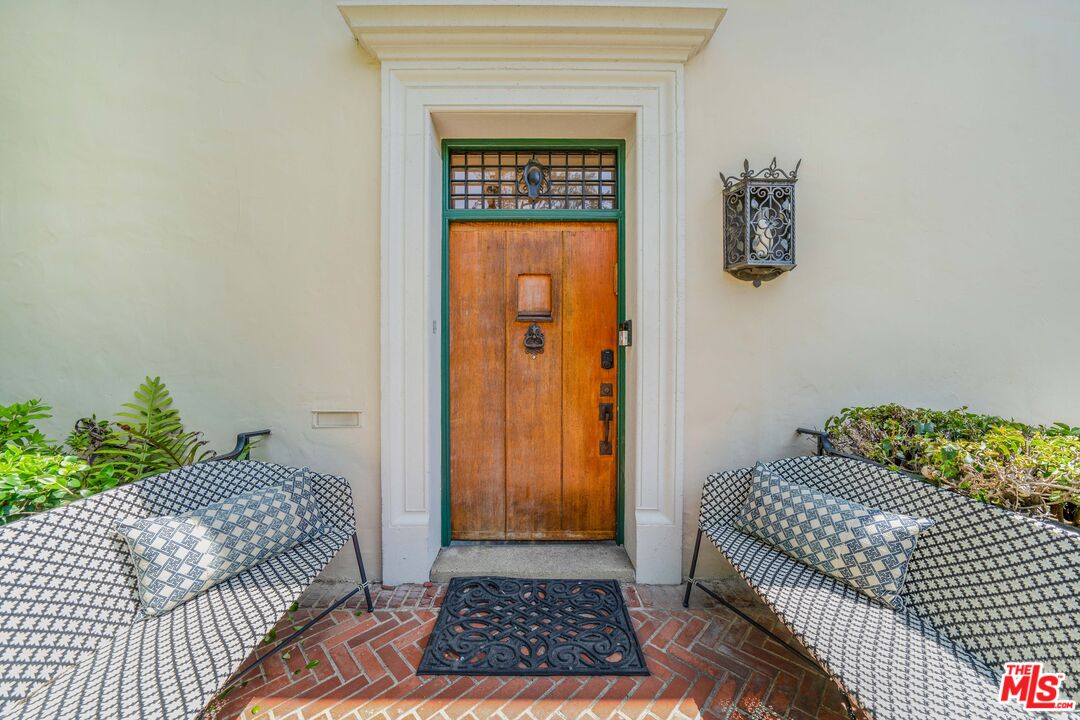4124 Dundee Drive Los Angeles, CA 90027 - Photo 7 of 54 a bedroom with a bed and a window