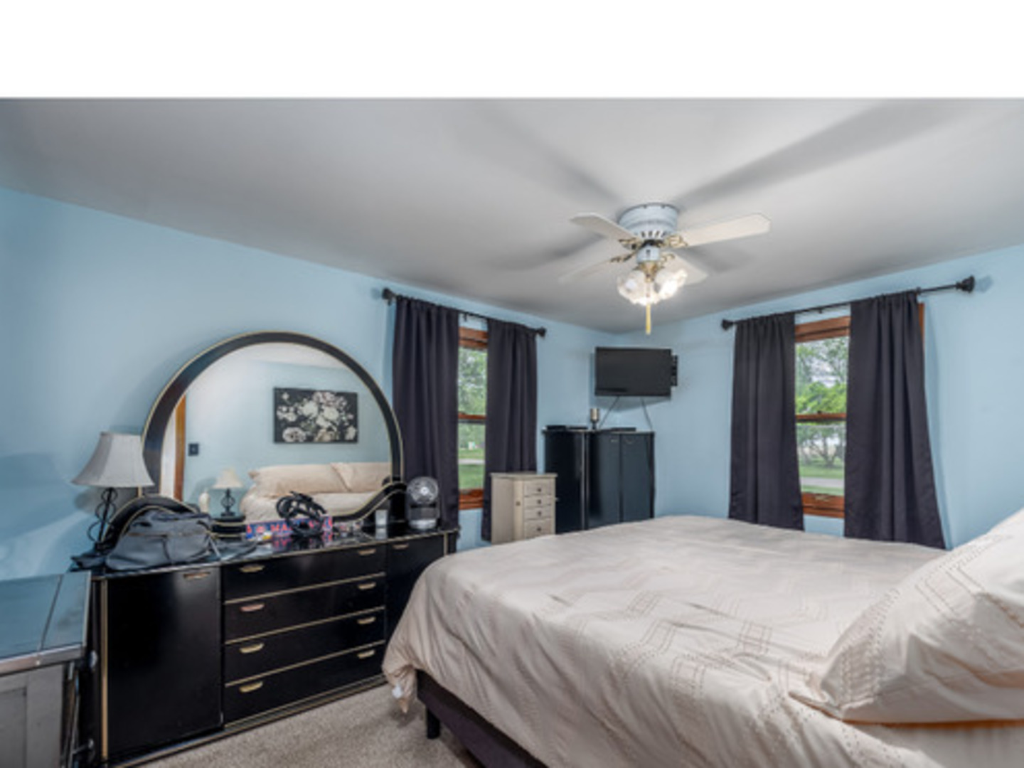 1907 Coalville Road Streator, IL 61364 - Photo 13 of 30 a bedroom with a bed and a chandelier