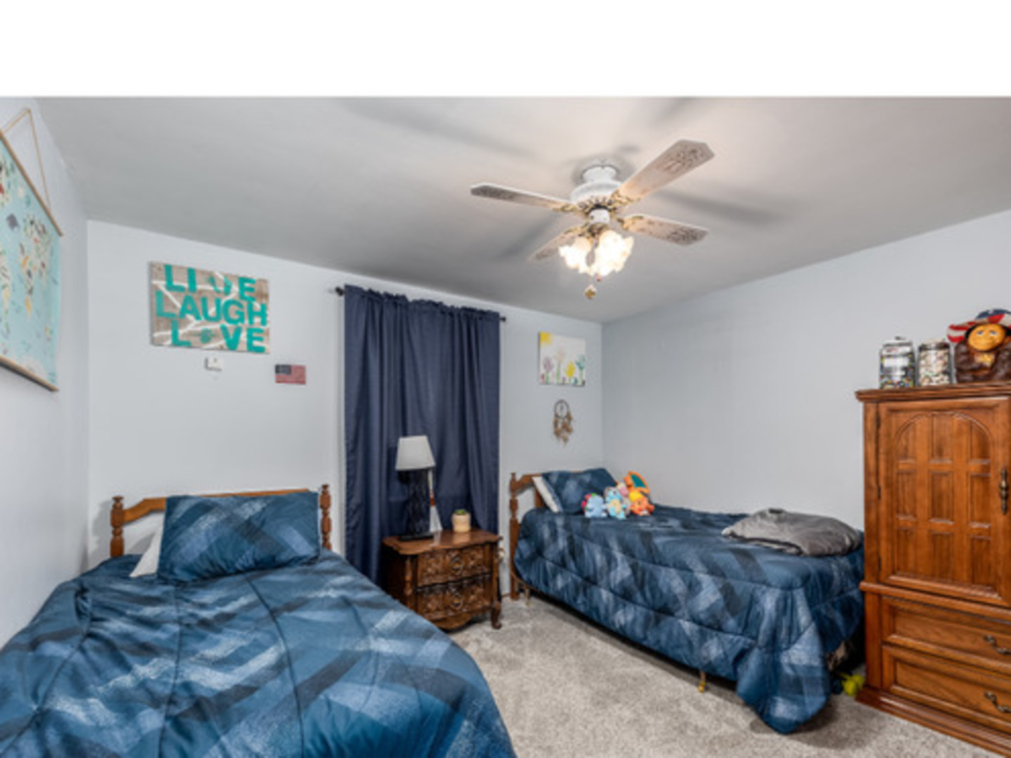 1907 Coalville Road Streator, IL 61364 - Photo 14 of 30 a bed room with a bed and a chandelier