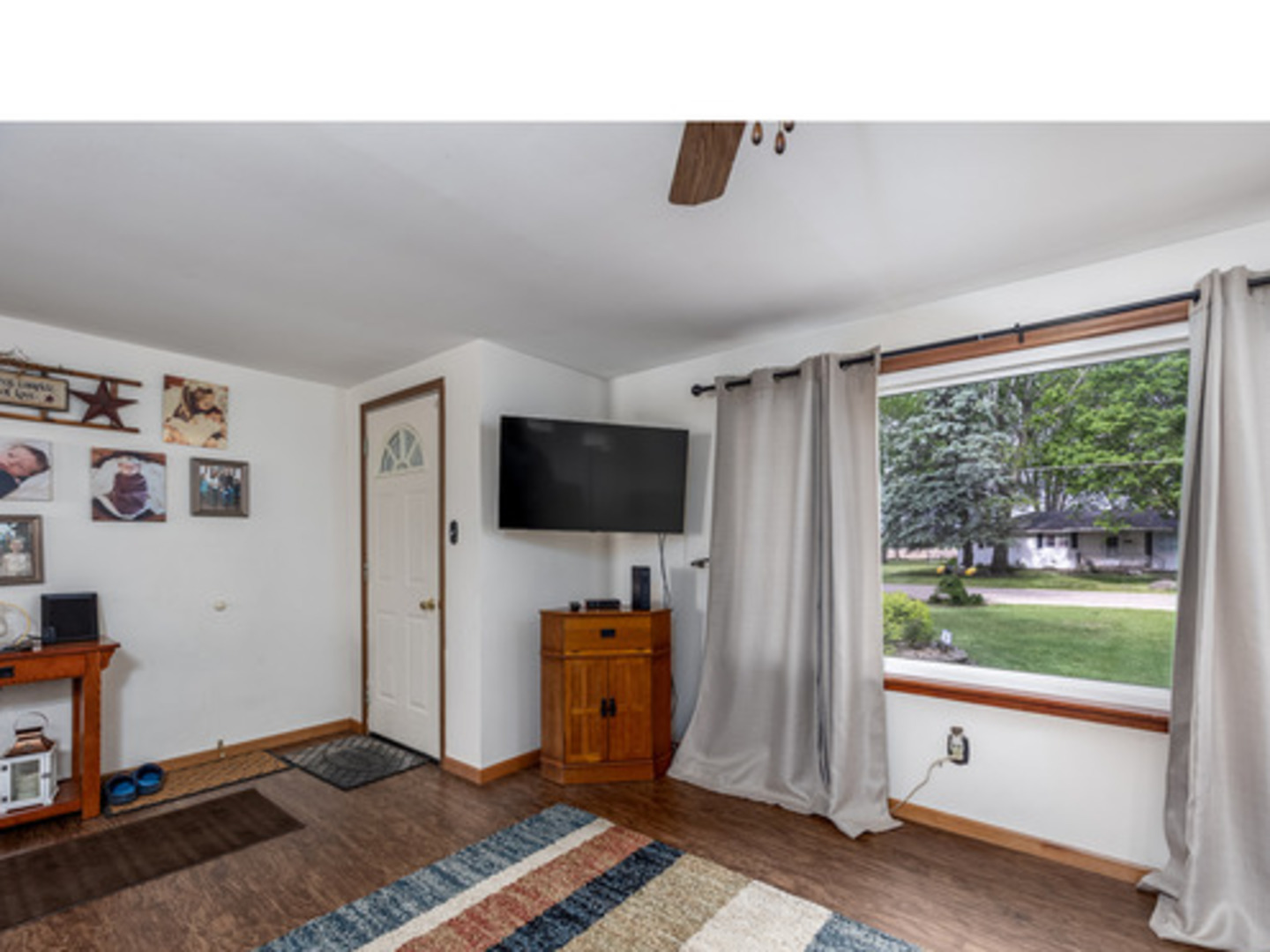 1907 Coalville Road Streator, IL 61364 - Photo 7 of 30 a living room with furniture and a flat screen tv