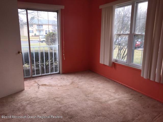 502 Harding Road Freehold, NJ 07728 - Photo 3 of 9 an empty room with windows