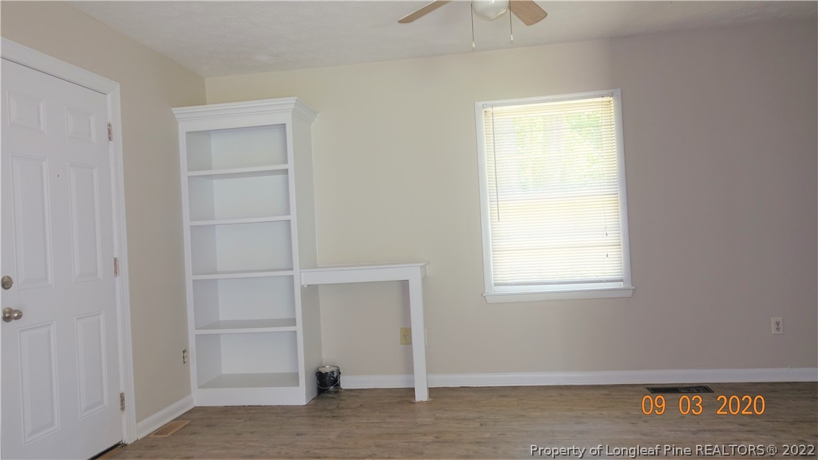 5856 Columbine Road Fayetteville, NC 28306 - Photo 11 of 25 an empty room with windows and closet