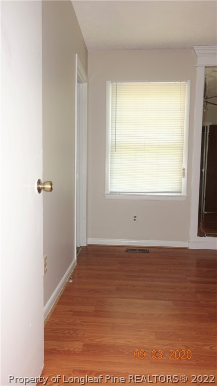 5856 Columbine Road Fayetteville, NC 28306 - Photo 17 of 25 a view of an empty room with a window