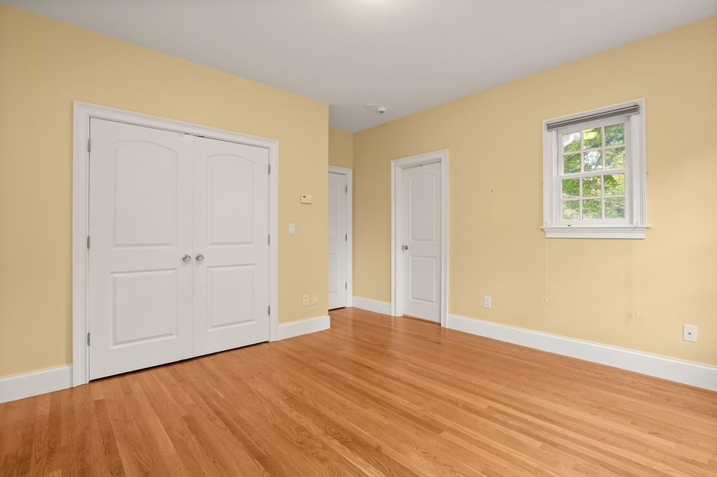1 Fairbanks Road Lexington, MA 02421 - Photo 24 of 42 a view of an empty room with wooden floor