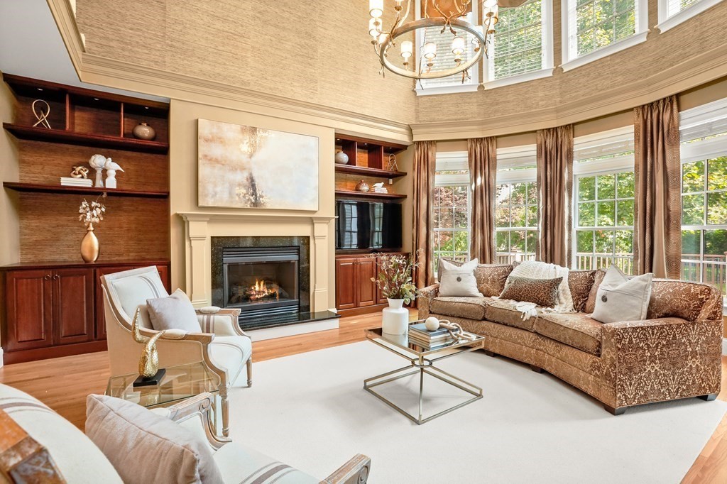 1 Fairbanks Road Lexington, MA 02421 - Photo 6 of 42 a living room with furniture a fireplace and a large window