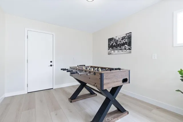 a view of a livingroom with furniture and wooden floor