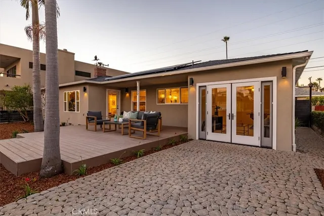 a kitchen with stainless steel appliances a stove and cabinets