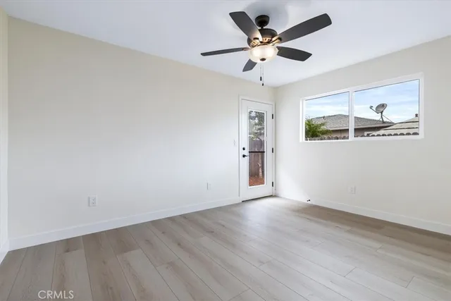 a view of a balcony with furniture
