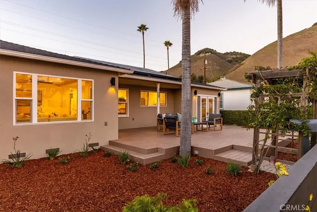a view of a houses with a garden