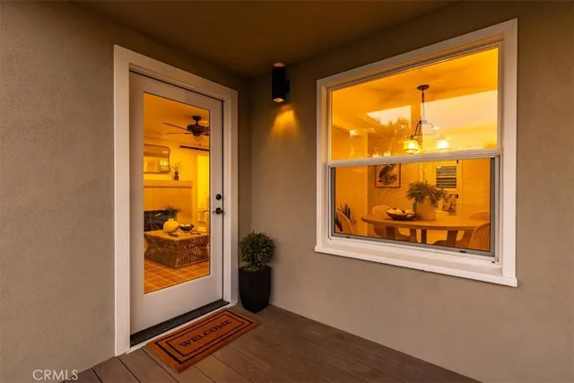 a view of an empty room and a window