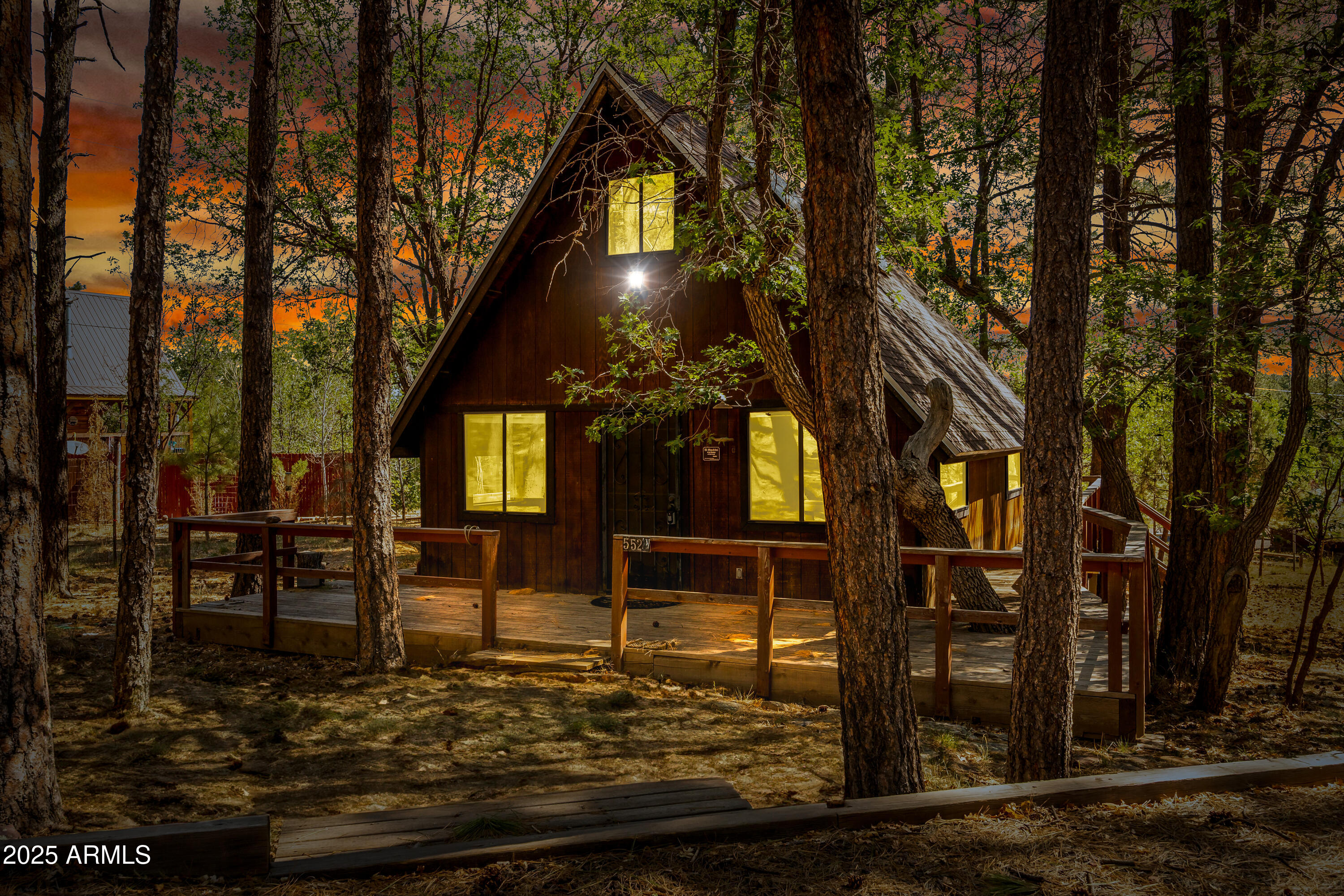 5528 Deer Run Pinedale, AZ 85934 - Photo 1 of 9 a backyard of a house with lots of green space