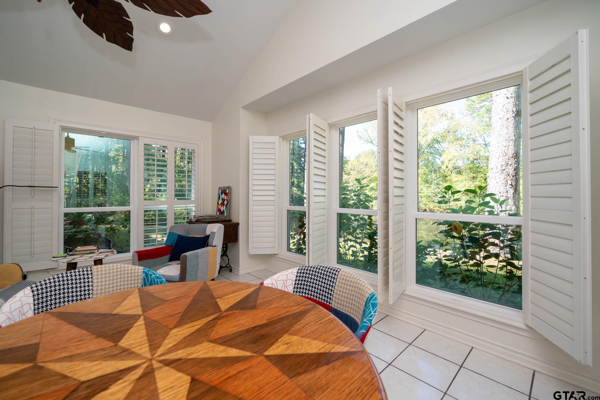431 Gifford Street Rusk, TX 75785 - Photo 23 of 48 a bed sitting in a bedroom next to a window