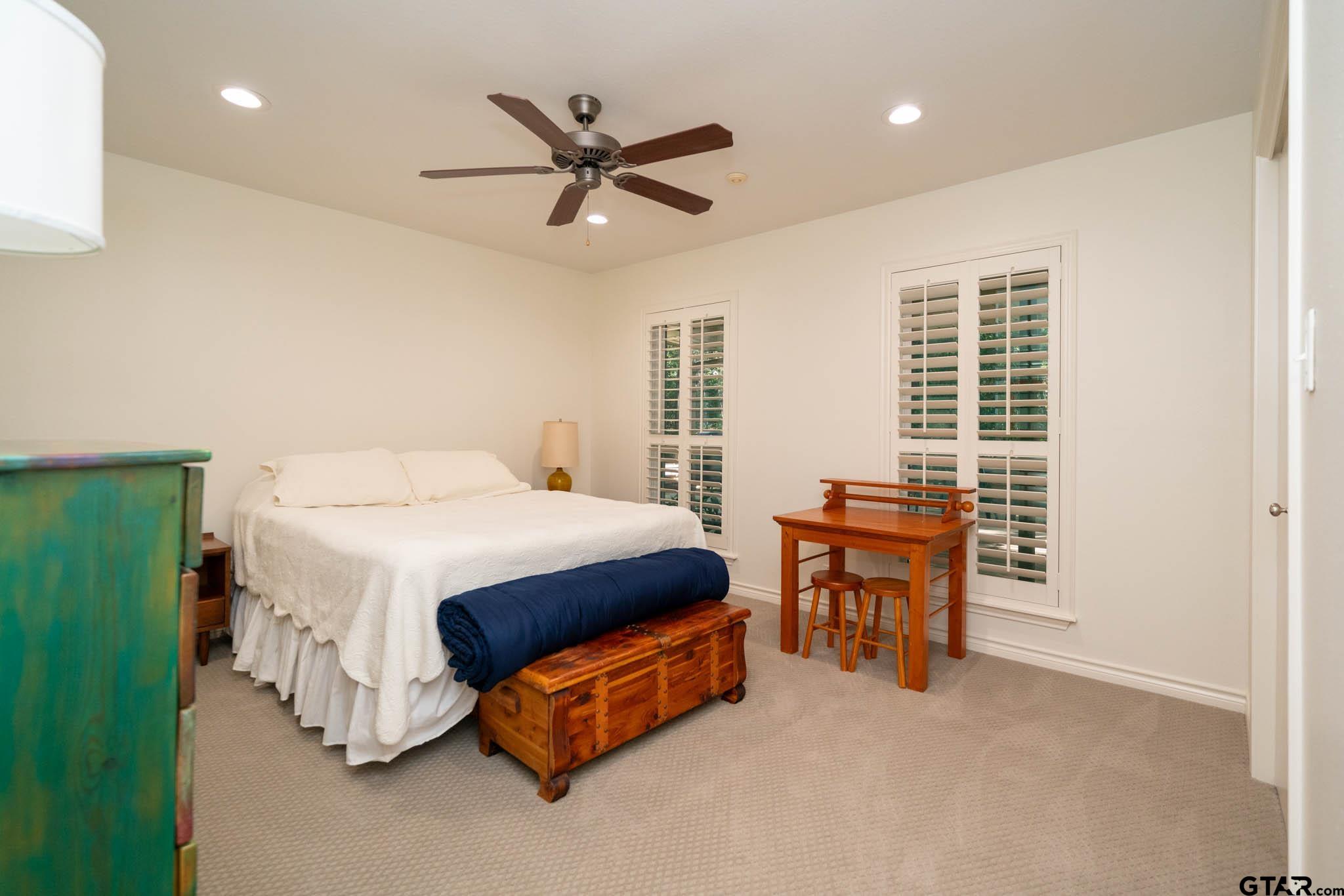 431 Gifford Street Rusk, TX 75785 - Photo 28 of 48 a bedroom with a bed and chair