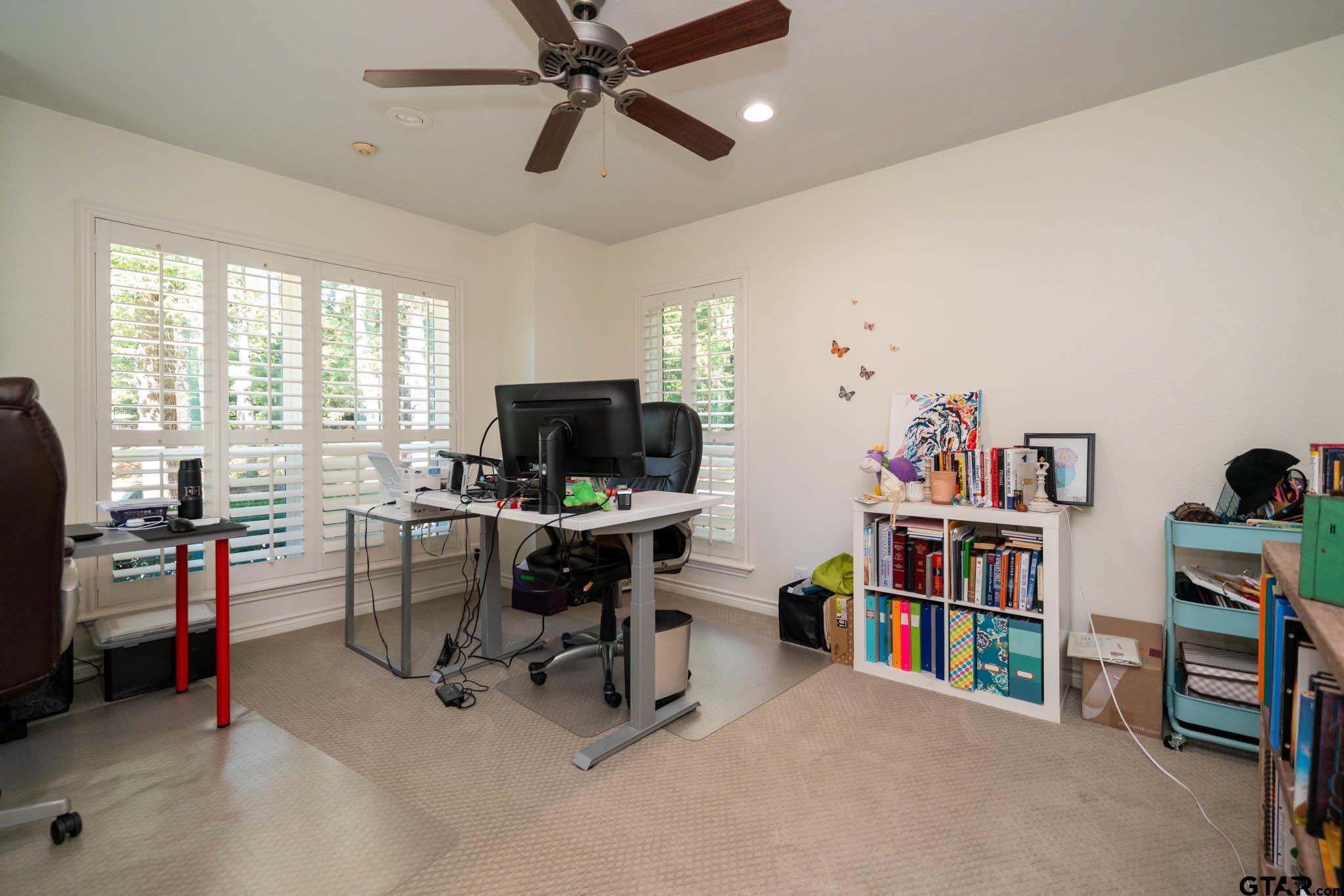 431 Gifford Street Rusk, TX 75785 - Photo 31 of 48 a view of a workspace with furniture and a window