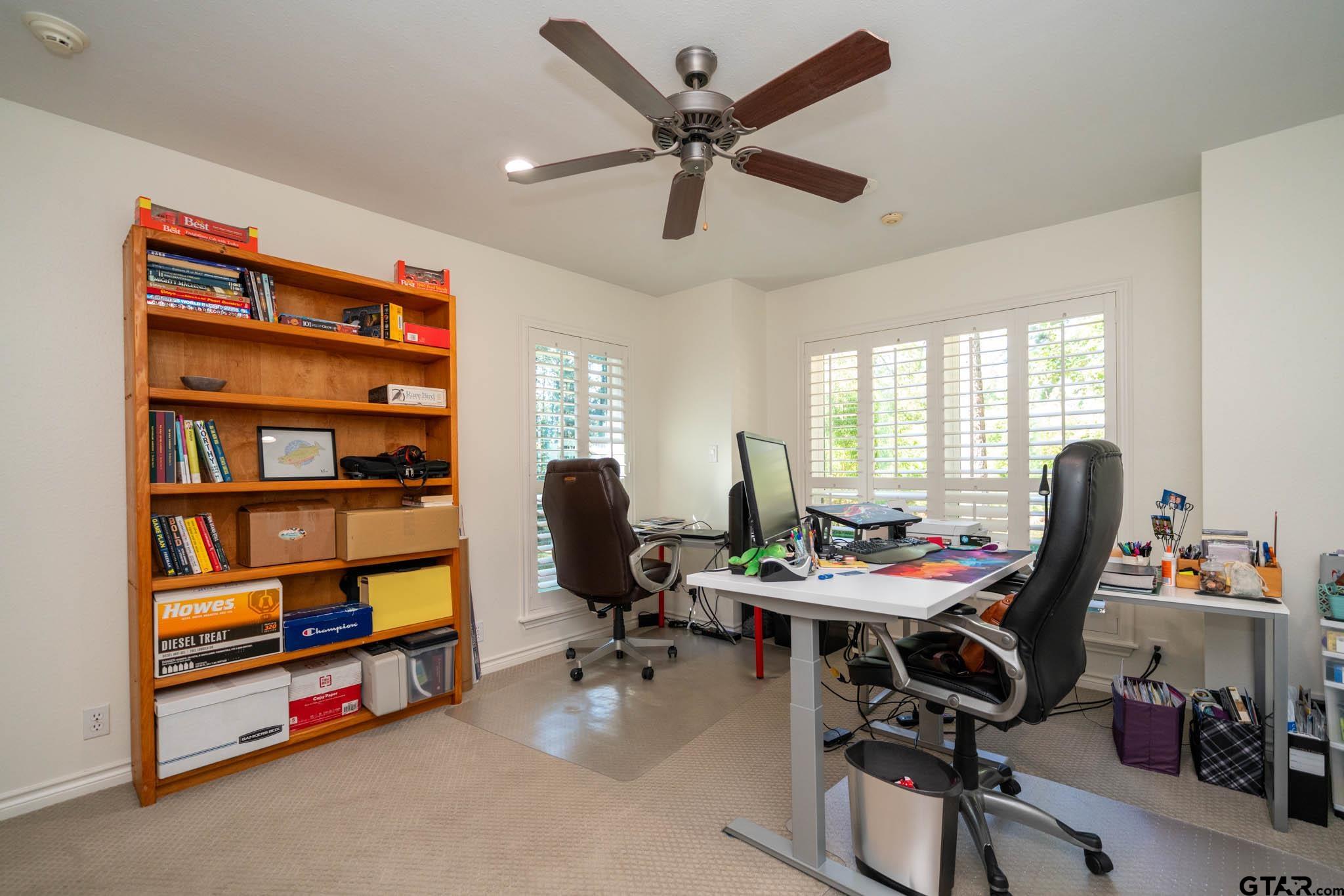 431 Gifford Street Rusk, TX 75785 - Photo 32 of 48 a view of a workspace with furniture and a window