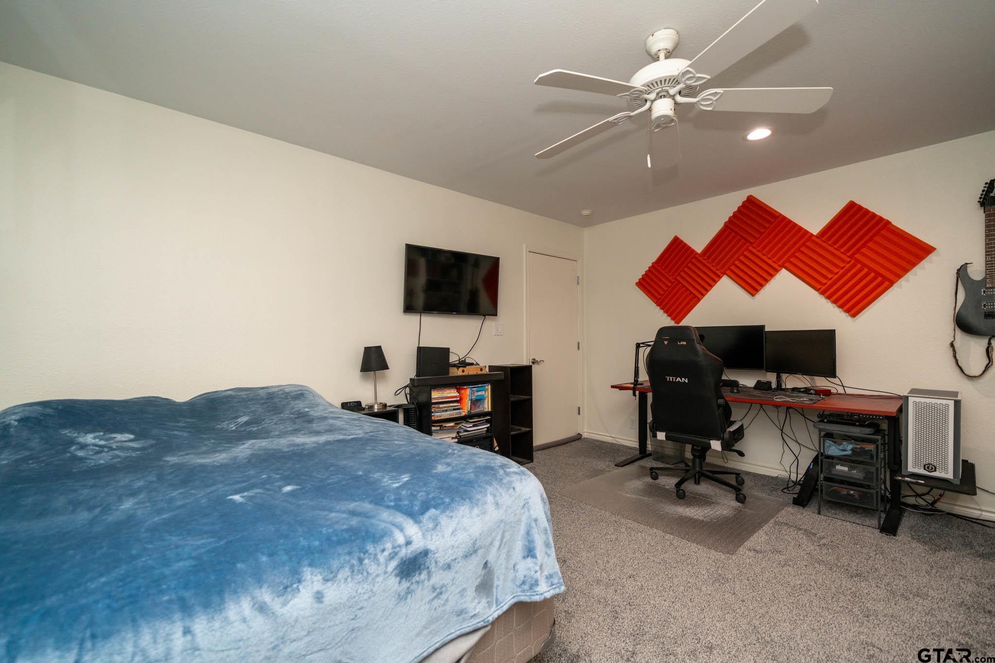 431 Gifford Street Rusk, TX 75785 - Photo 35 of 48 a bedroom with a workspace