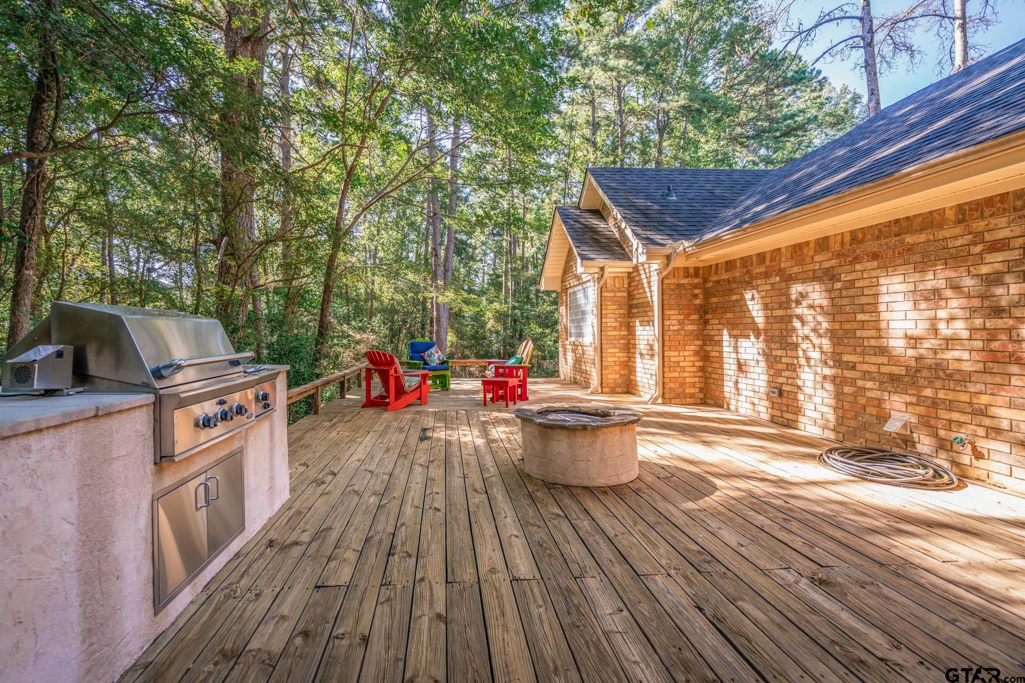 431 Gifford Street Rusk, TX 75785 - Photo 45 of 48 a view of roof deck with wooden floor and seating space